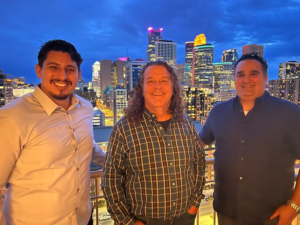Concept Services team members with a customer